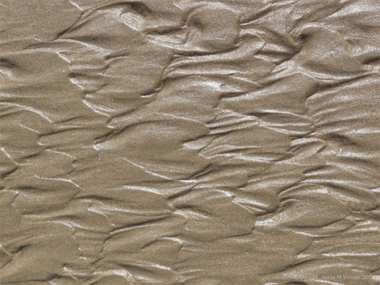 Natural patterns in the sand on the beach