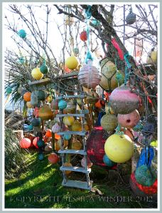 Tree of Beached Buoys - Tree decorated with multi-coloured plastic fishing buoys, floats, ropes, and boat ladder, washed ashore as flotsam at Broughton Bay, Gower, West Glamorgan. P1210233aBlog