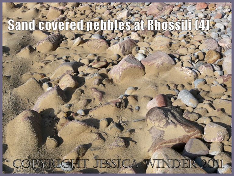 Pebbles and sand picture: Pebbles partially covered by wind-blown sand at Rhossili Bay, Gower, South wales, UK (P1430155aBlog4)