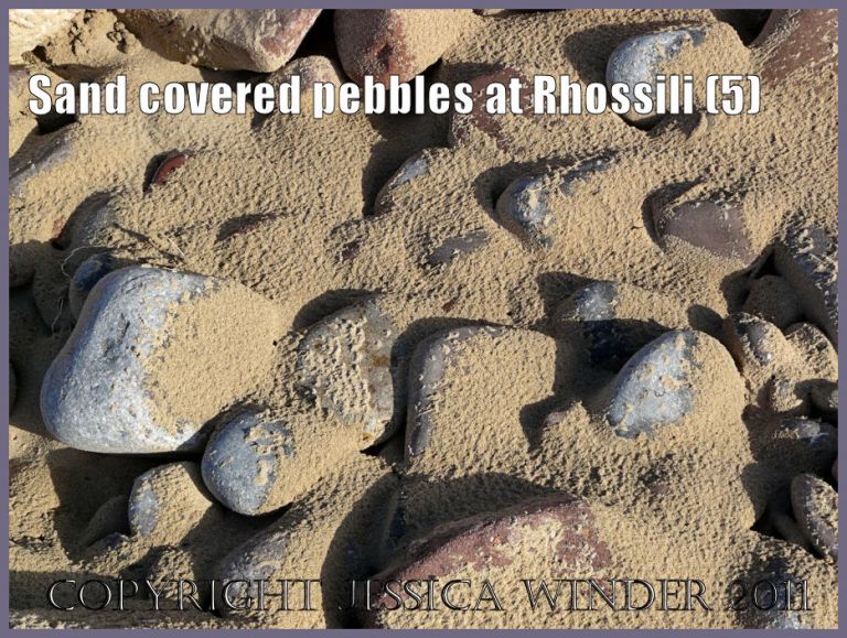 Picture of pebbles and sand: Pebbles from Rhossili Bay, Gower, South Wales, UK, covered with wind-blown sand (P1430159aBlog5)