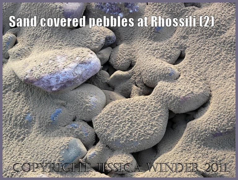 Gower beach picture: Pebbles coated by drifting sand at Rhossili Bay, Gower, South Wales, UK (P1430219aBlog2)