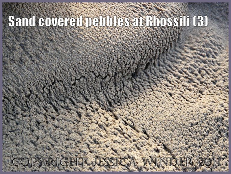 Sand texture photograph: Wind-blown sand covering a pebble bed on Rhossili beach, Gower, South Wales, UK (P1430221aBlog3)