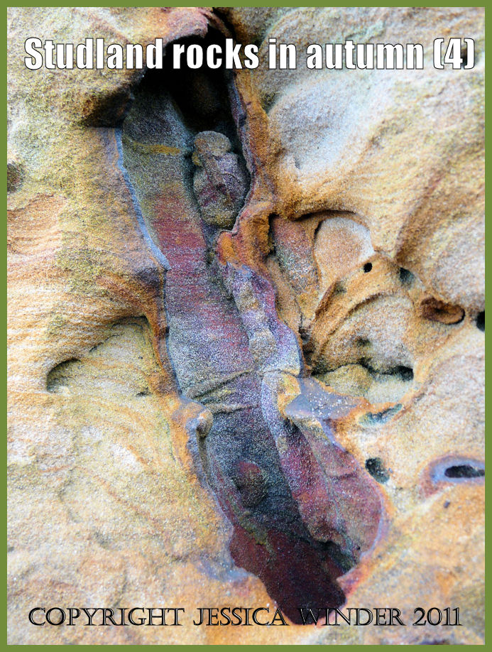 Studland Bay rock: Rocks at Studland Bay, Dorset, UK - part of the Jurassic Coast. A vertical section through a naturally occurring rainbow-coloured iron-lined 'pipe' in the rock strata (P1170403aBlog4)