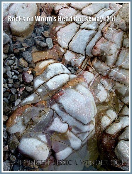 Cracks and crevices in rocks: Water-worn smooth Carboniferous limestone rock with intersecting cracks and crevices at low tide on Worms Head Causeway, Rhossili, Gower, South Wales, UK (7)