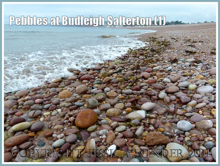 Triassic red pebbles on the Jurassic Coast: Budleigh Salterton pebble beach at the water's edge looking west - part of the Jurassic Coast UK (1)