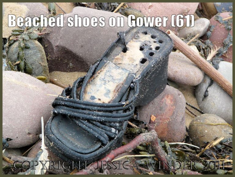 Flotsam shoe: Ladies wedge-soled sandal found on the beach at Rhossili Bay, Gower, South Wales, UK (61)