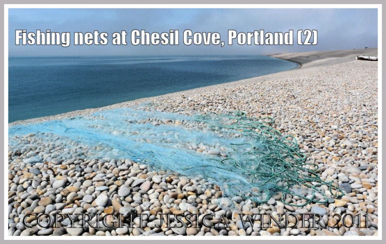 Drying nets at Chesil Cove: Fishing nets spread out to dry on the shingle shore at Chesil Cove, Portland, Dorset, UK - part of the Jurassic Coast (2)
