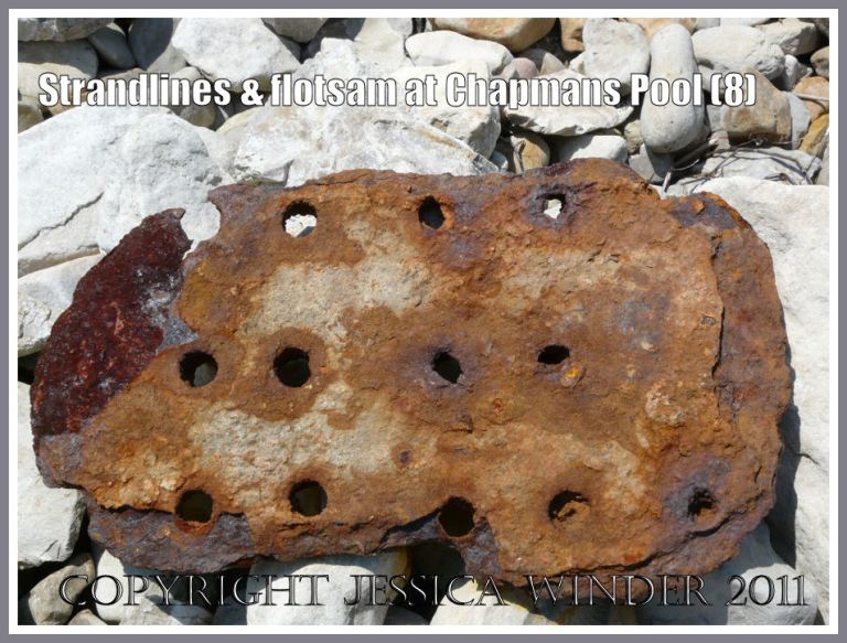 P1100252aBlog8 Rusty iron flotsam object on the outer boulder beach by the boathouses at Chapmans Pool, Dorset, UK - part of the Jurassic Coast (8) Rusty iron flotsam object on the outer boulder beach by the boathouses at Chapmans Pool, Dorset, UK - part of the Jurassic Coast (8)