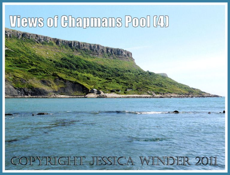 View of Chapmans Pool, Dorset, UK, on the Jurassic Coast World Heritage Site, looking across to the boathouses at the base of Emmetts Hill from the beach beneath Houns Tout (4)