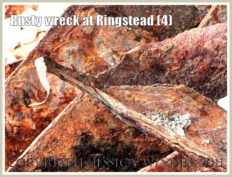 Texture of rusty iron: Detail from a rusty iron ship wreck at Ringstead Bay, Dorset, UK - part of the Jurassic Coast (4)