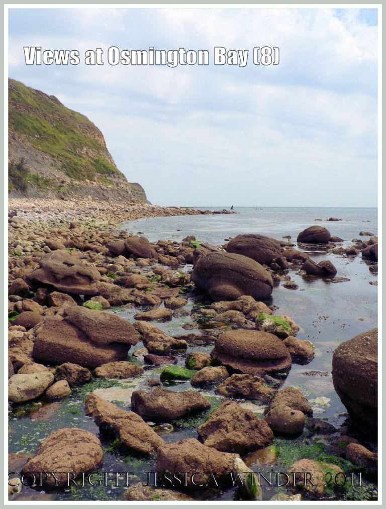 View at Osmington Bay, Dorset, UK, with rounded boulders, looking east towards Bran Point and Ringstead Bay (8)