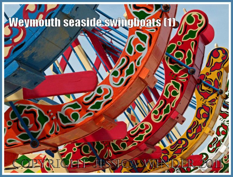 Brightly painted swingboats on the golden sands at Weymouth, Dorset, UK (1)