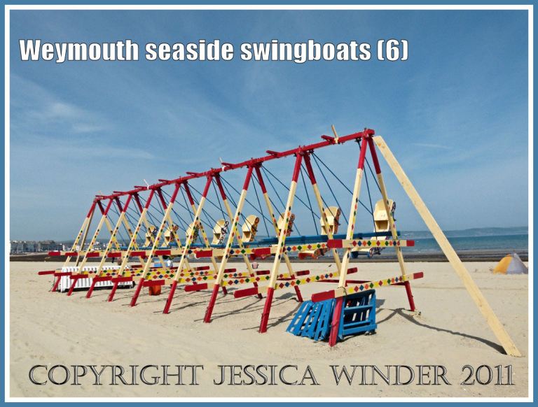 Brightly painted swingboats on the golden sands at Weymouth, Dorset, UK (6)