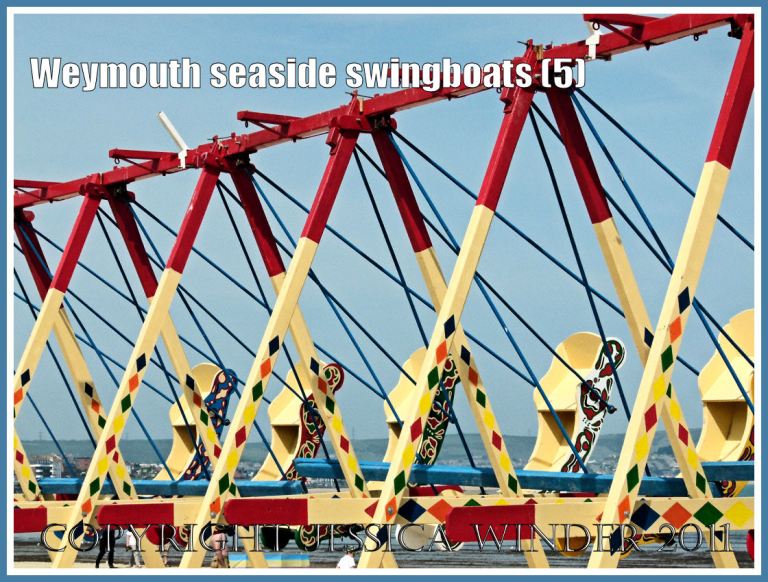Brightly painted swingboats on the golden sands at Weymouth, Dorset, UK (5)