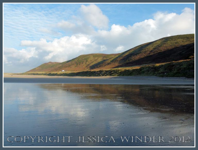 Reflection of Rhossili Down at Low Tide - The Down reflected in the wet sand left by the high tide at Rhossili Bay, Gower, South Wales, 12.12.2012 