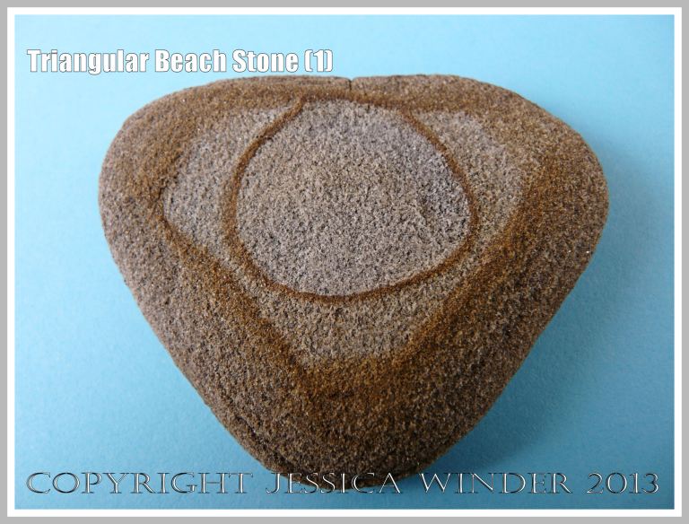 Triangular Beach Stone (1) - Natural triangular shape of a pebble or beach stone with a natural geometrical pattern. 