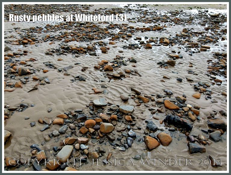 Rusty Pebbles at Whiteford (3) - Pebbles on the beach at Whiteford Sands, Gower, South Wales, some of which are covered with a rusty deposit thought to derive from the break up of an iron-pan associated with a Holocene peat layer.