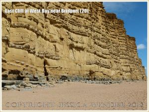 East Cliff at West Bay near Bridport (20) - At the base of the cliff there is a long, undulating, interrupted curve of hard strata instead of the normal level horizontal layer like those seen above it in the cliff face. This anomaly is thought to be a scour structure resulting from a major storm event disturbing an early deposition of Bridport Sand Formation.