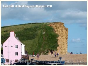 East Cliff at West Bay near Bridport (21) - View of East Cliff from the west. Approximately 43 metres depth of Bridport Sand Formation in the cliff was originally deposited at the rate of 1 metre every 20,000 years - taking about 860,000 years to accumulate in the Uper Lias phase of the Jurassic Period.