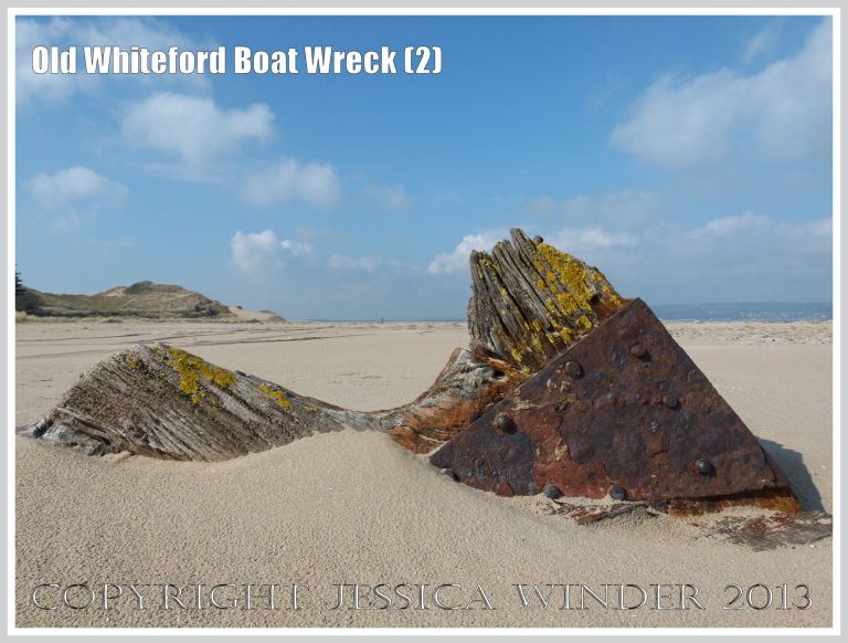 Remains of a small boat wreck in the sand