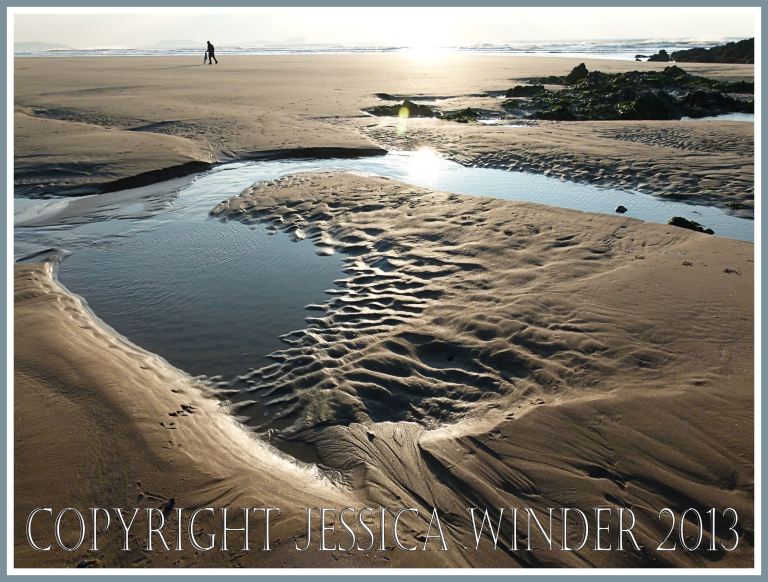 sand patterns and tide pools in late winter sunshine