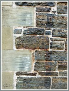A wall of local meta-sedimentary rocks in one of the Historic Properties on the Halifax waterfront, Nova Scotia, Canada.