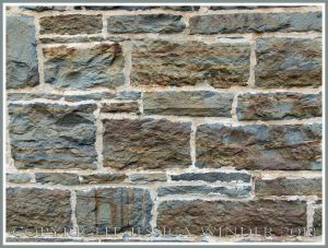 A wall of local meta-sedimentary rocks in one of the Historic Properties on the Halifax waterfront, Nova Scotia, Canada.