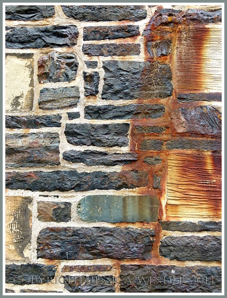 A wall of local meta-sedimentary rocks in one of the Historic Properties on the Halifax waterfront, Nova Scotia, Canada.