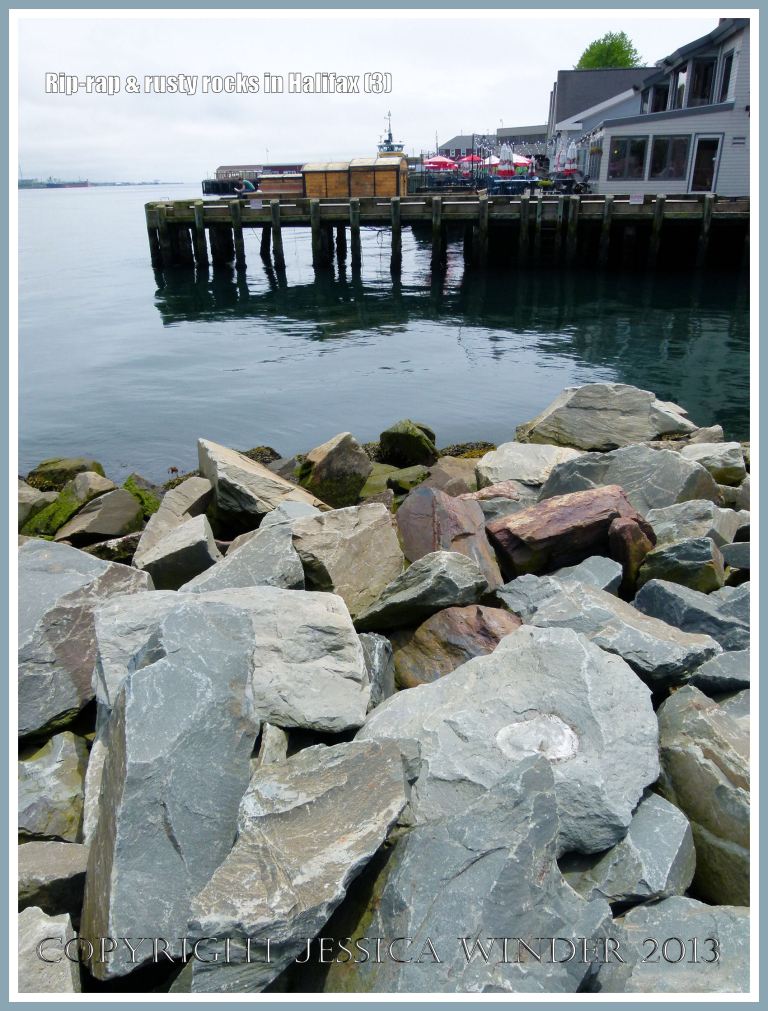 Protective rock rip-rap along the Halifax Harbour waterfront, Nova Scotia, Canada.