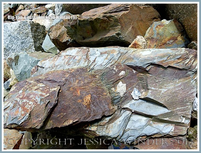 Protective rock rip-rap along the Halifax Harbour waterfront, Nova Scotia, Canada.