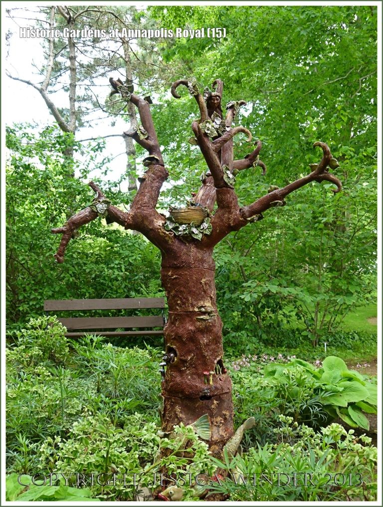 Sculpture "Treeology" by Marla Benton, Teresa Bergen and Mary Jane Lundy at Historic Gardens, Annapolis Royal, Nova Scotia, Canada.