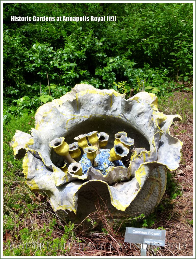 Sculpture "Cabbage Flower" by Alexis Doiron at Historic Gardens in Annapolis Royal, Nova Scotia, Canada.