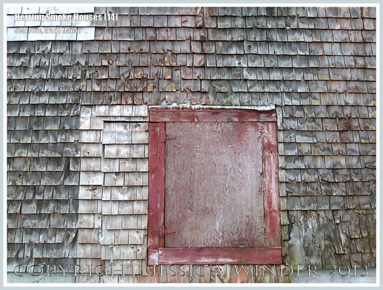 Detail of weathered wooden shingles on an old herring smoke house at Seal Cove, on the island of Grand Manan, New Brunswick, Canada.