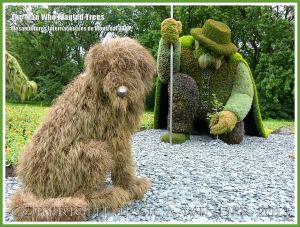 Shepherd and dog - part of a mosaiculture tableau depicting the shepherd who changed a desolate and arid land into fertile fields and forest by planting trees.