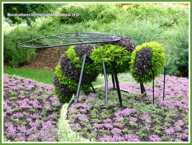 Giant bee sculpted from living plants at the Jardins Botanique Montreal