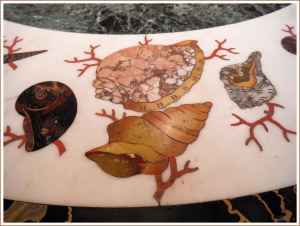 Stone seashells decorating a 19th century table top in 'pietre dure' style.