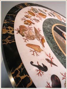 Stone seashells decorating a 19th century table top in 'pietre dure' style.