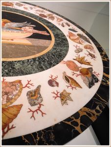 Stone seashells decorating a 19th century table top in 'pietre dure' style.