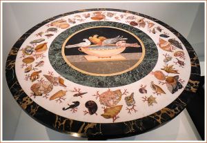 Stone seashells decorating a 19th century table top in 'pietre dure' style.