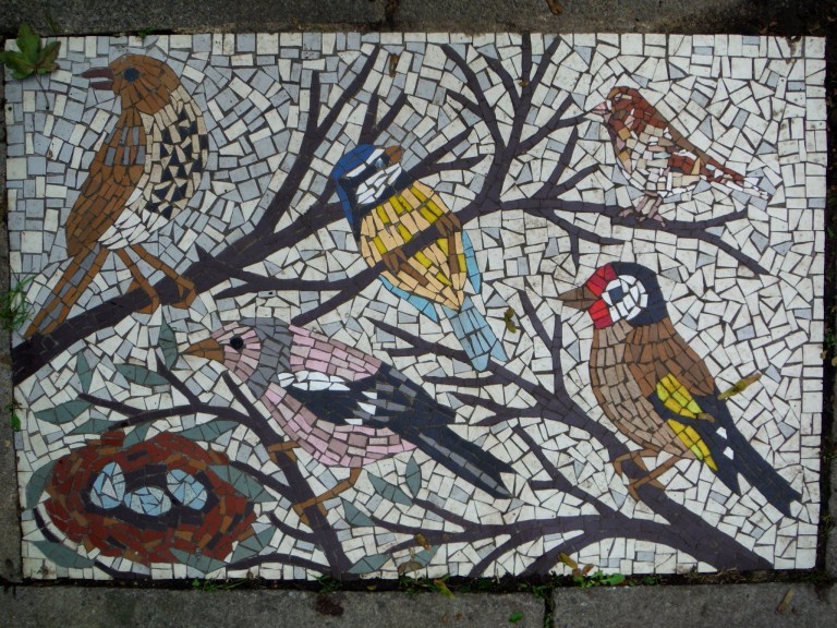 Pavement mosaic picture of common British birds