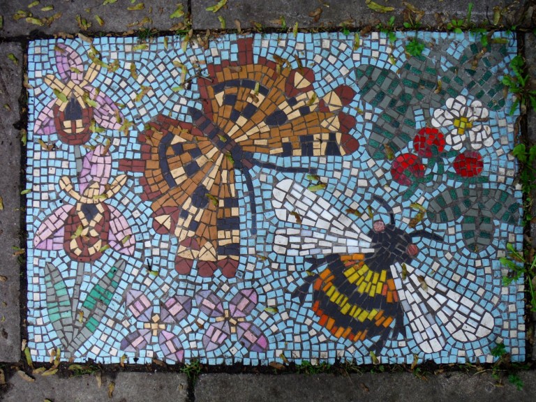 Mosaic pavement picture with butterflies and bees