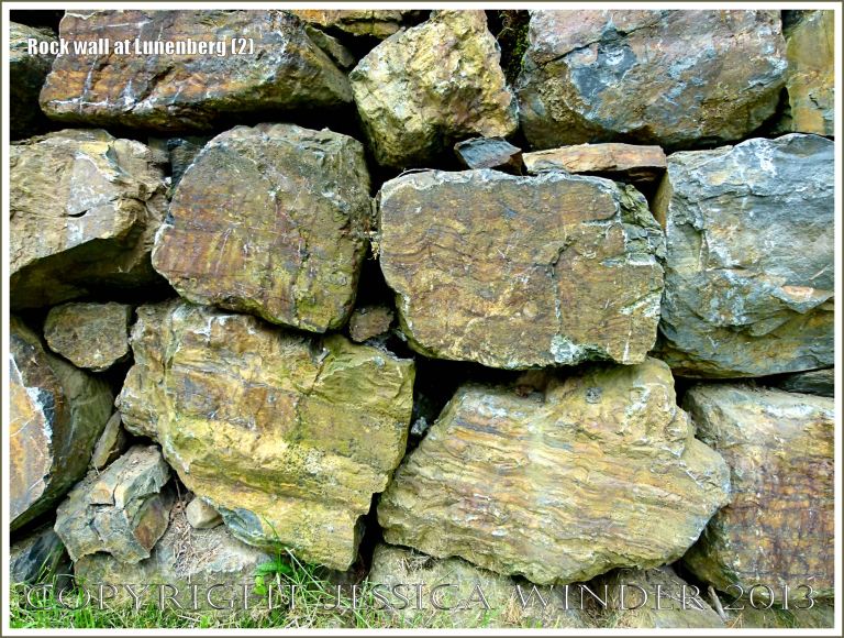 Natural rock colours, patterns, and textures in a wall at Lunenberg