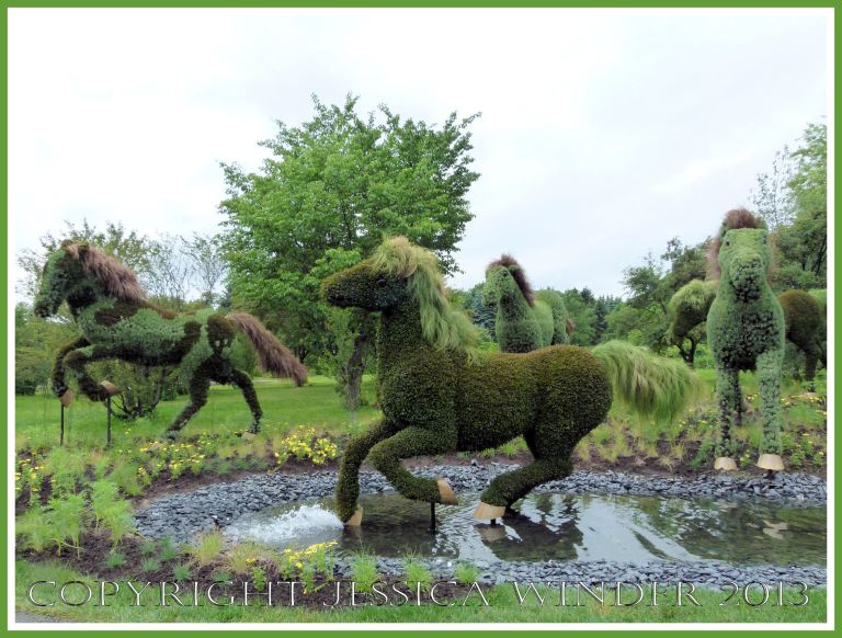 Mosaiculture sculpture horses made with living plants as part of "Mother Earth" tableau.