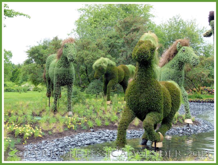 Mosaiculture sculpture horses made with living plants as part of "Mother Earth" tableau.
