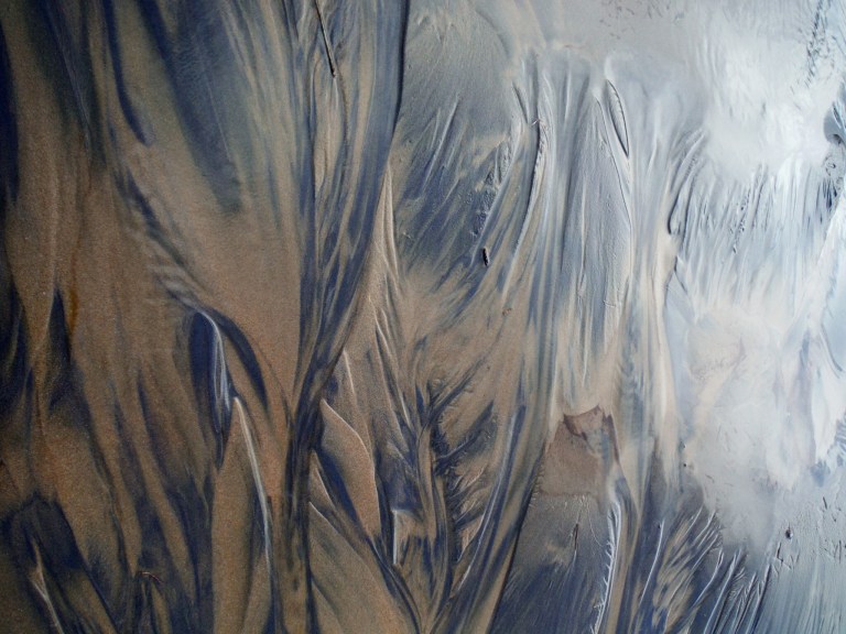 Natural abstract pattern on a sandy beach