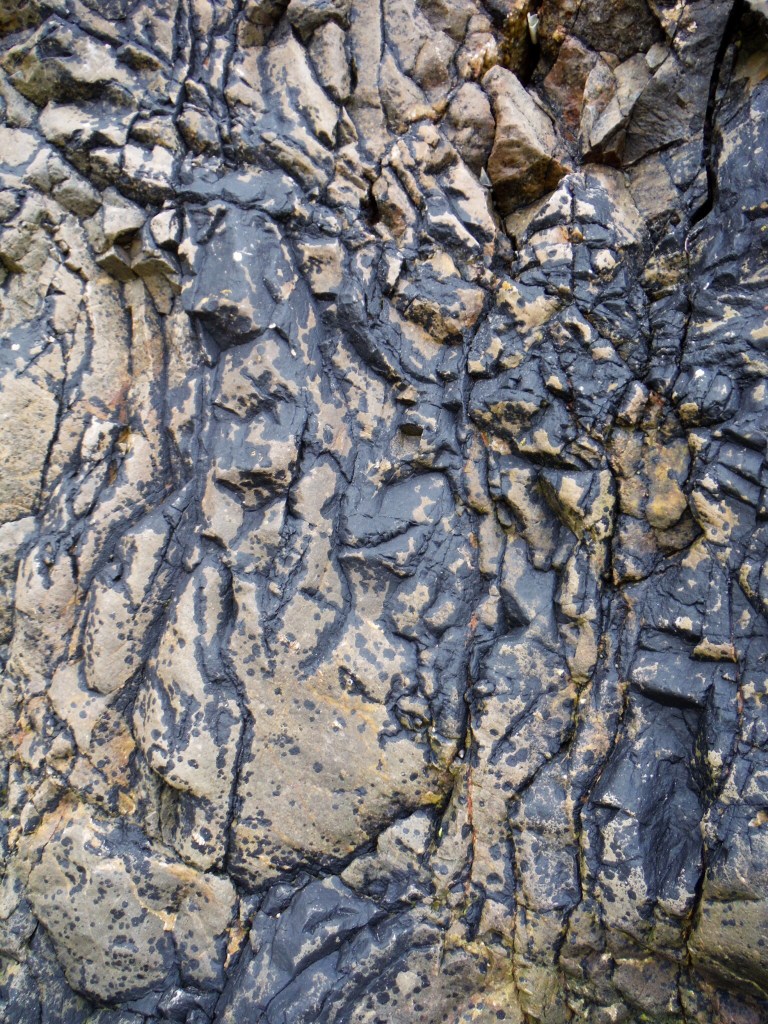 Colour, pattern and texture in limestone rock face