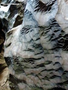 Naturally scuplted walls in a cave passage at Mewslade Bay
