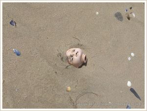 Doll's head washed ashore as flotsam