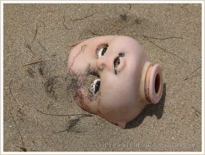 Doll's head washed ashore as flotsam