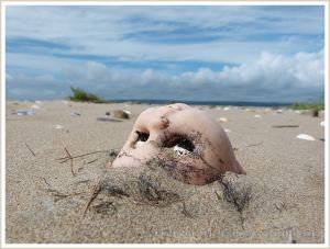 Doll's head washed ashore as flotsam
